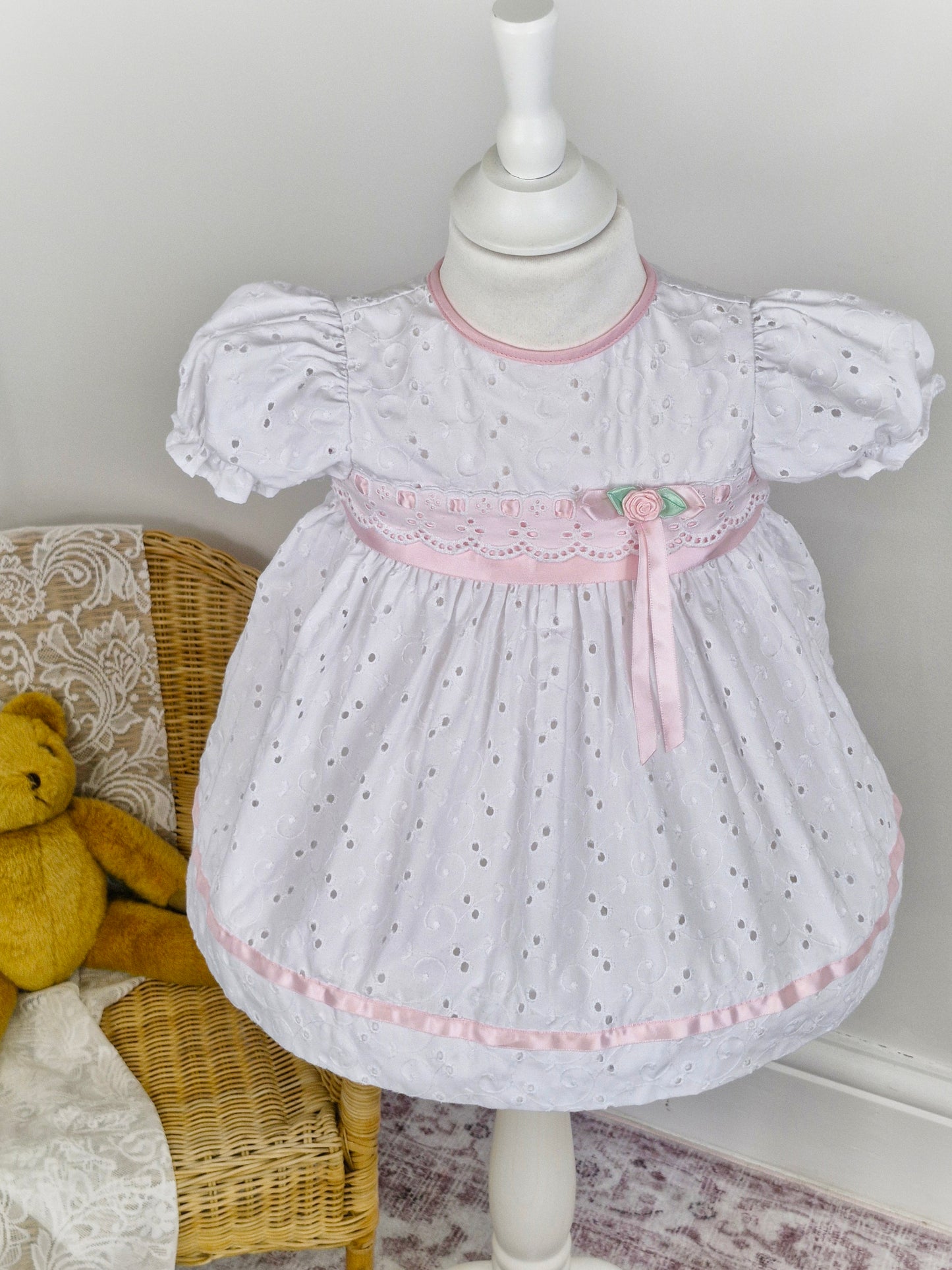 18 months. White broderie anglais dress with pink ribbon