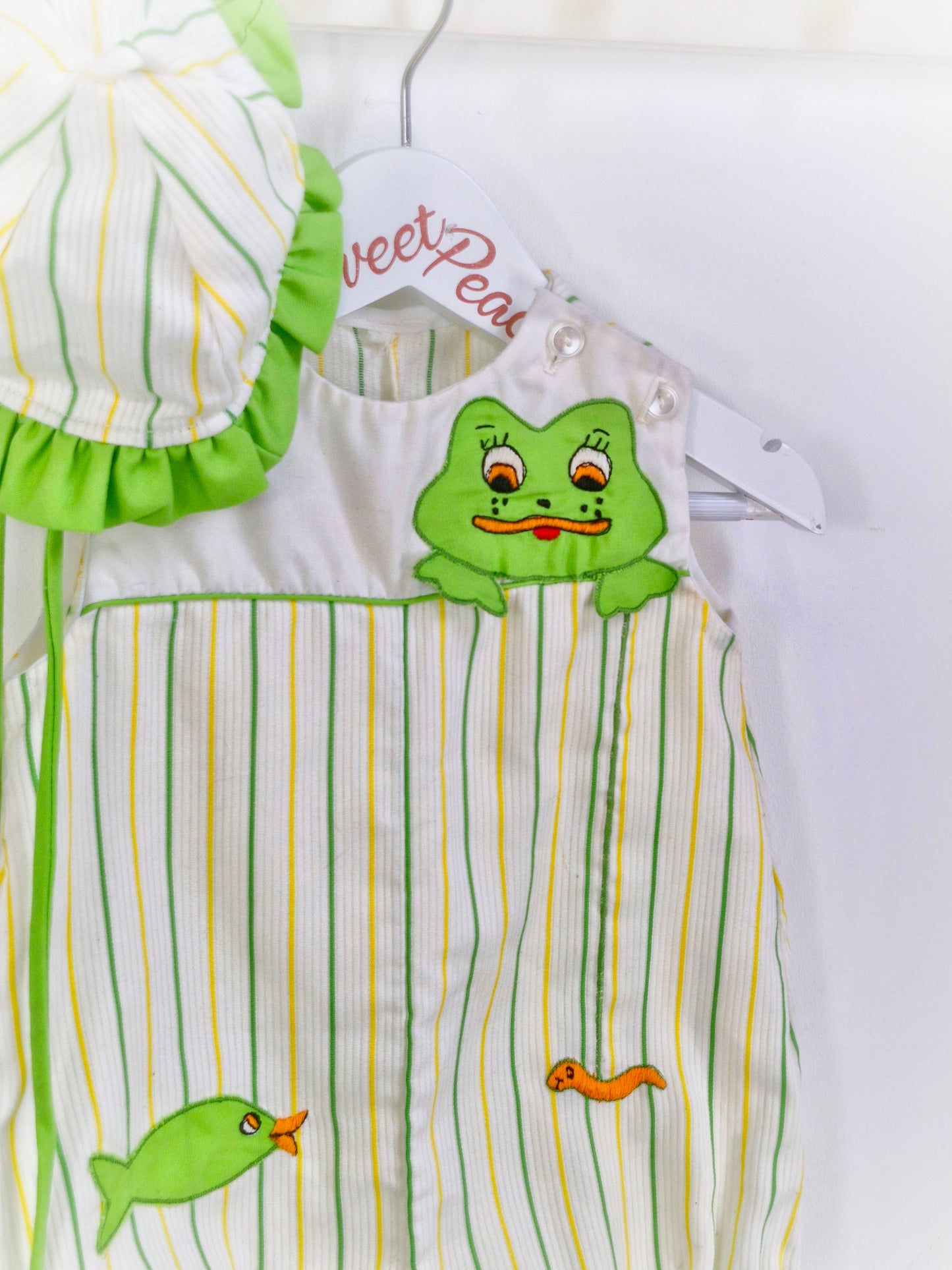 9 months. Romper and hat set, lemon and green with frog and fish details