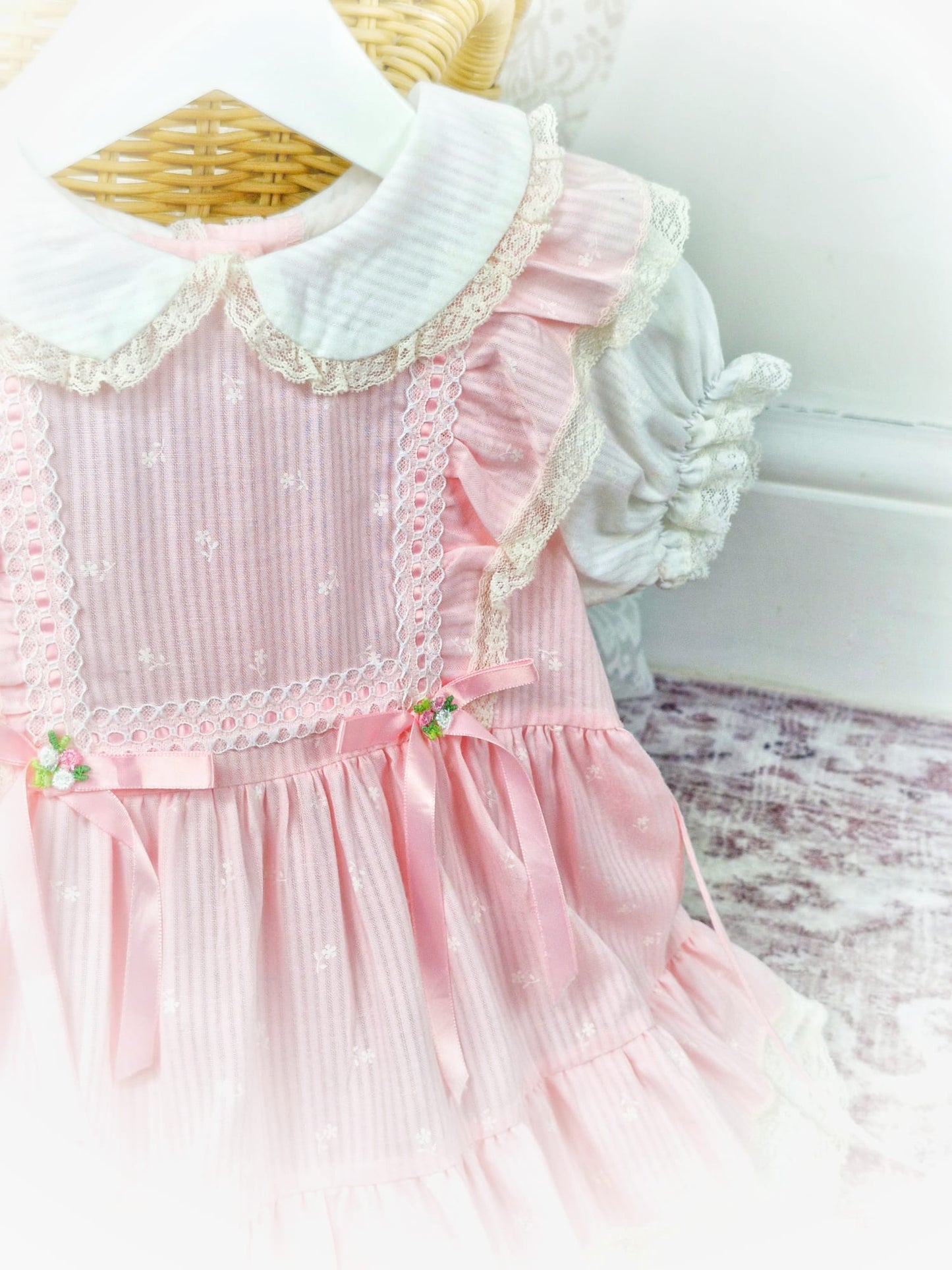 12-18 months. Pink and white vintage dress from Toddle Time, flutter shoulders, puff sleeves, lace and ribbon