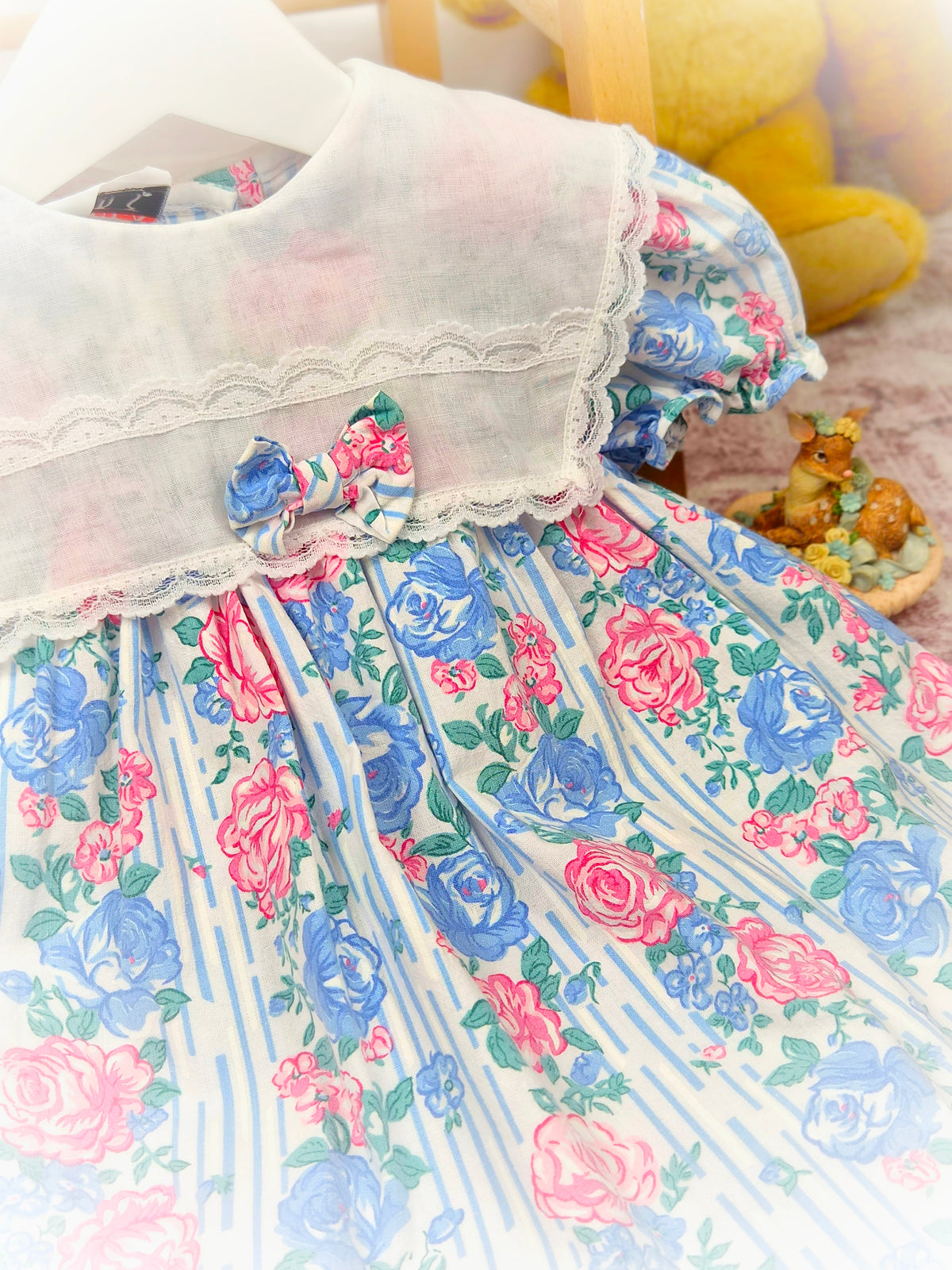 18-24 months. Vintage Kalula Kids dress with blue and pink floral design, large white bib with bow & lace details