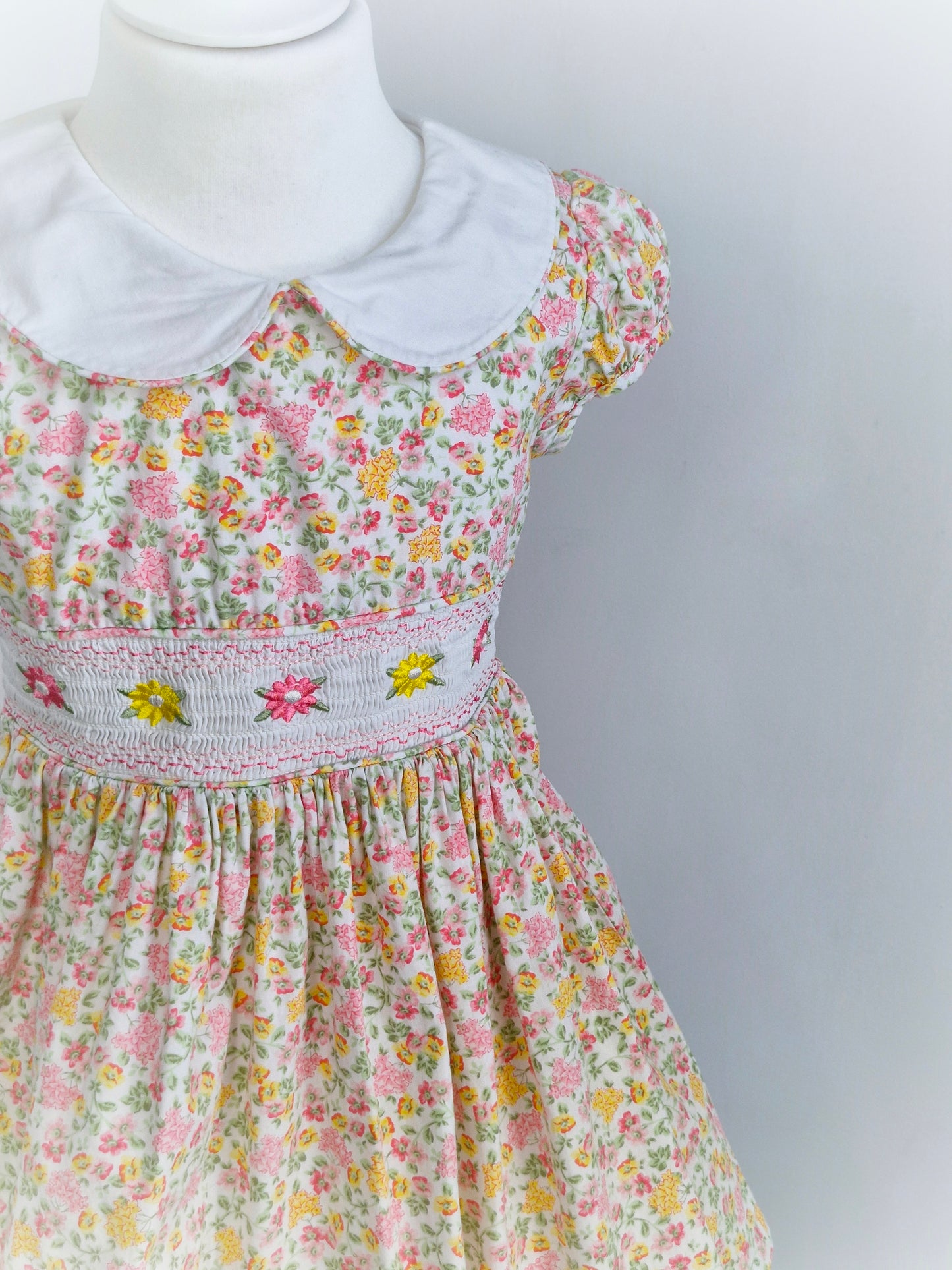 4 years. Bonnie Jean, floral smock dress with Peter Pan collar