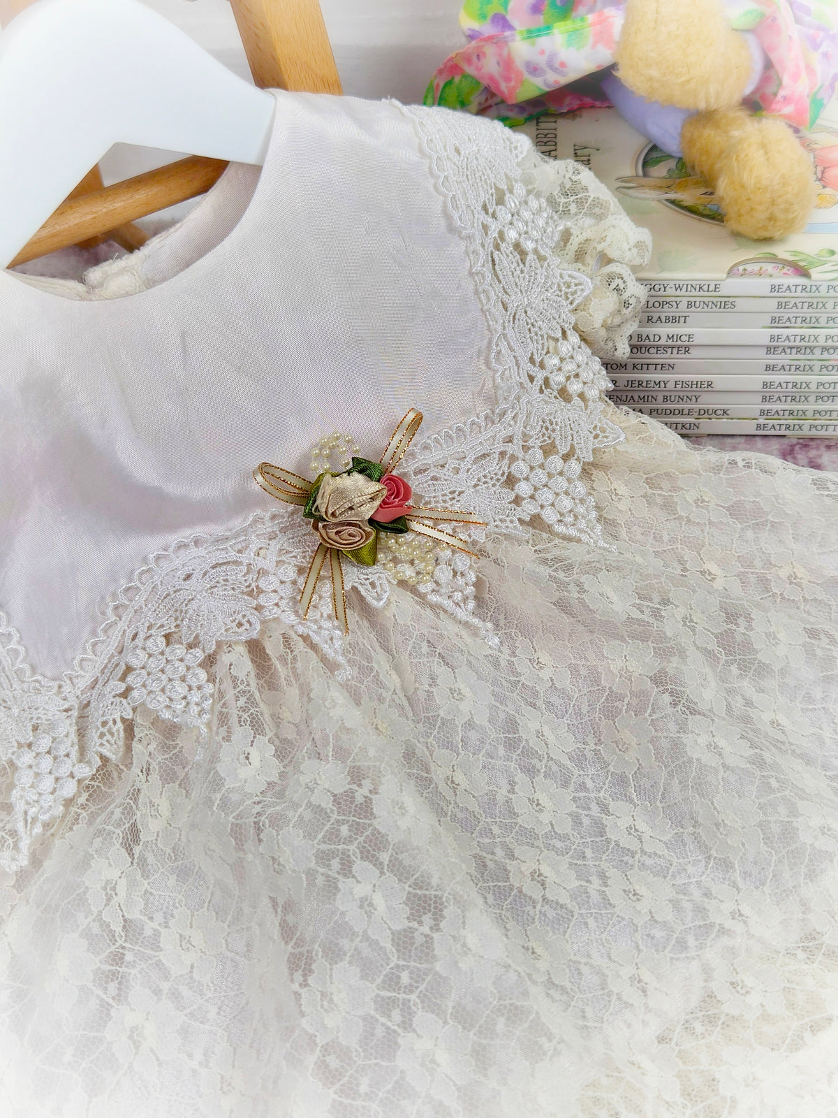 12-18 months. Cream lace vintage dress with beautiful bib trim and floral centre