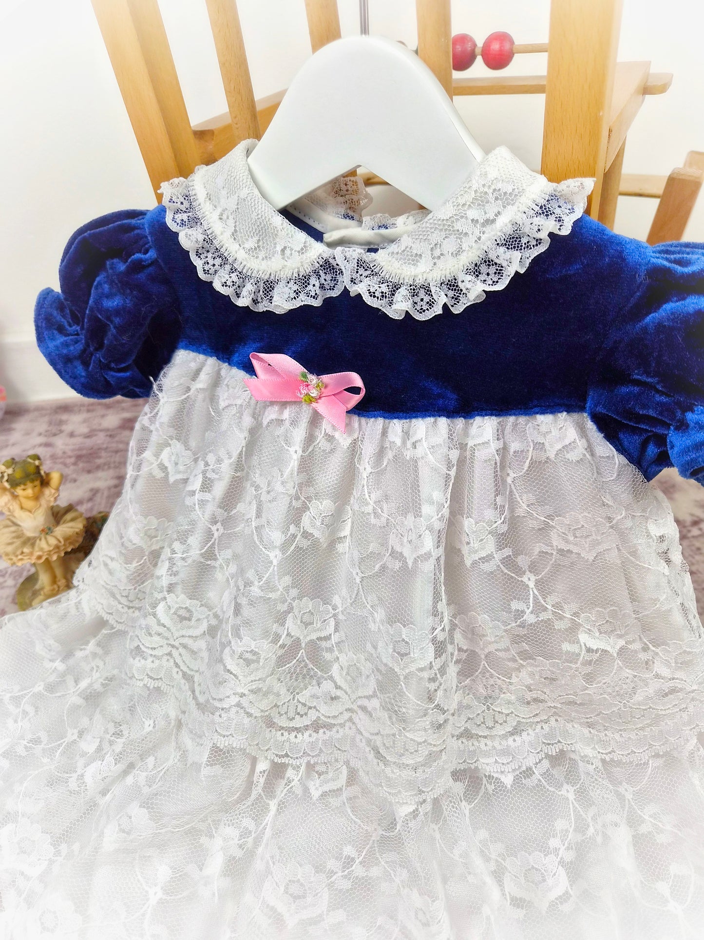 18-24 months. Vintage Roanna, navy velvet chest and sleeves with white lace layers and collar and pink satin bow