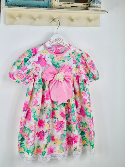 3-4 years. Bright floral Roanna dress with big bow and flower