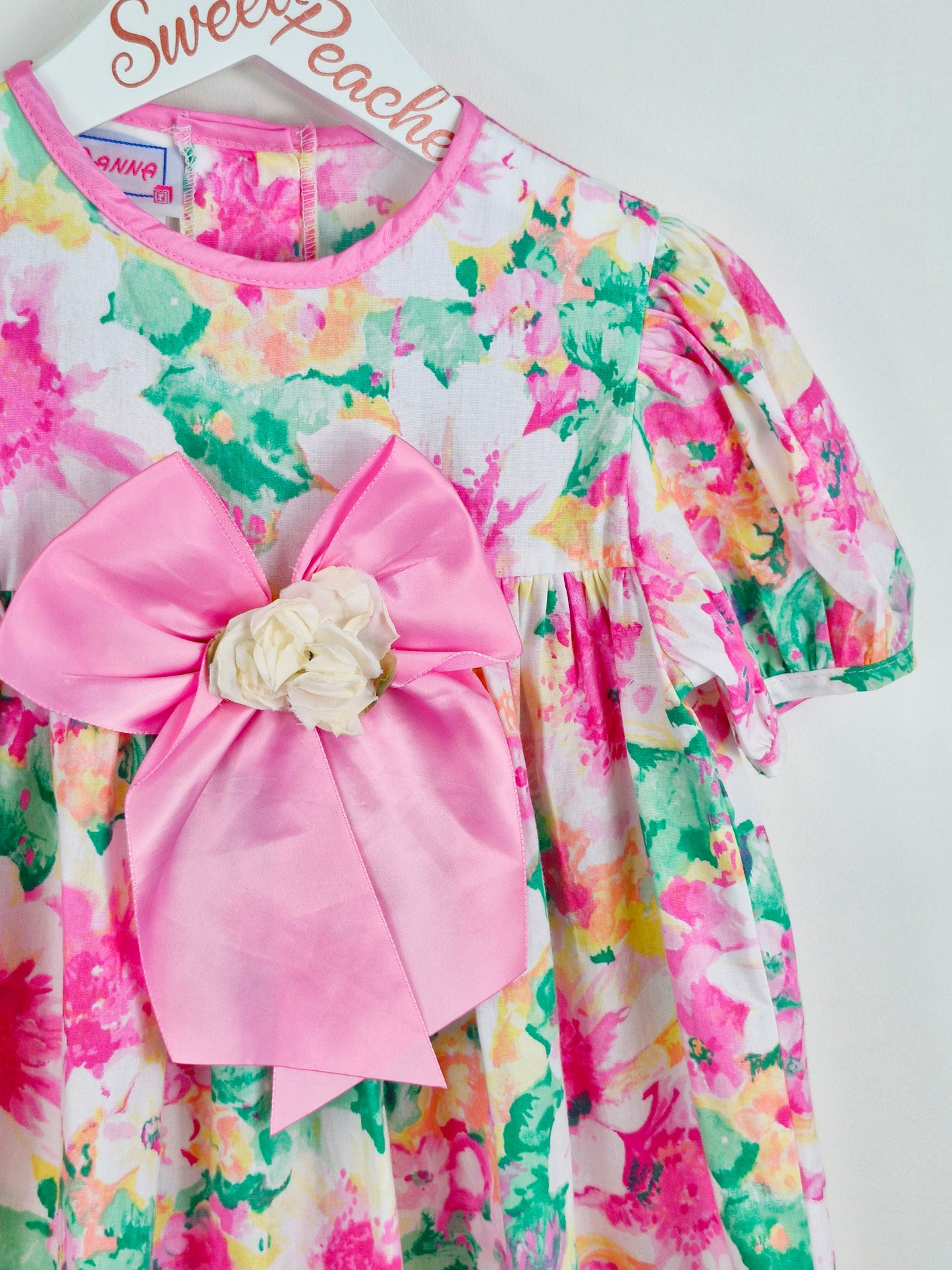 3-4 years. Bright floral Roanna dress with big bow and flower