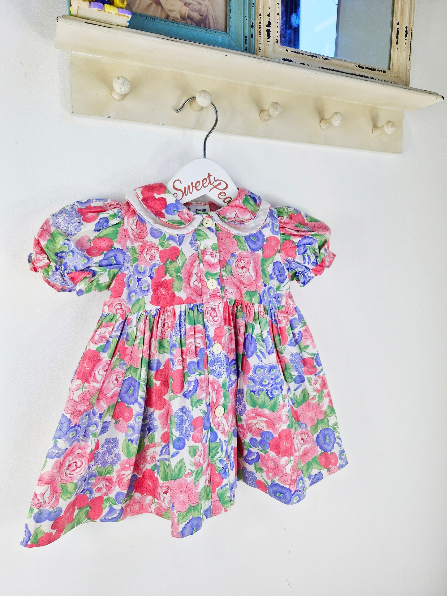 12 months. Fruit and floral print dress with buttons down the front and double collar