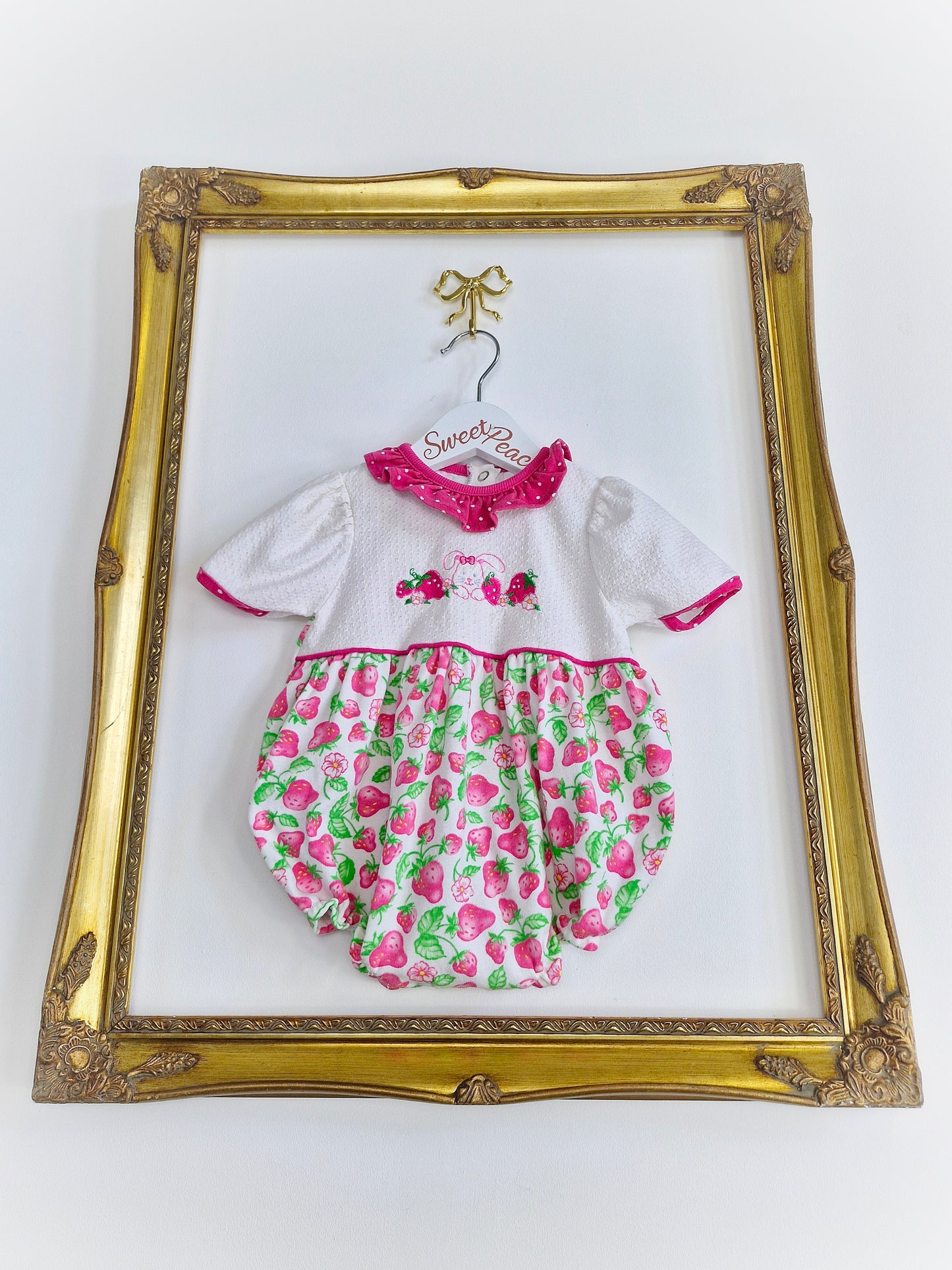 9-12 months. Healthtex romper with strawberry print, embroidered bunny and pink polka dot collar