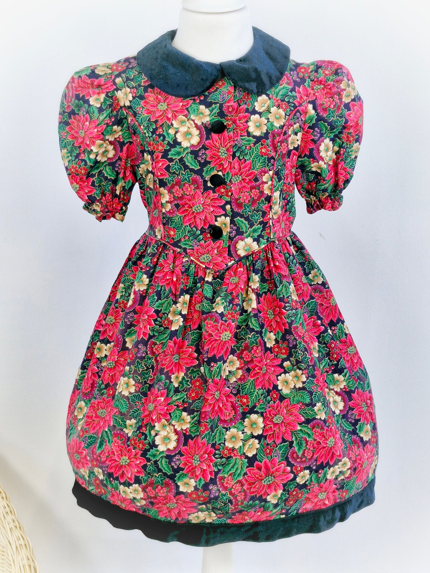 5-6 years. Vintage festive floral dress with black velvet collar and buttons from Rare Editions