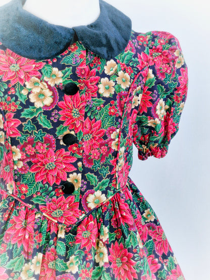 5-6 years. Vintage festive floral dress with black velvet collar and buttons from Rare Editions