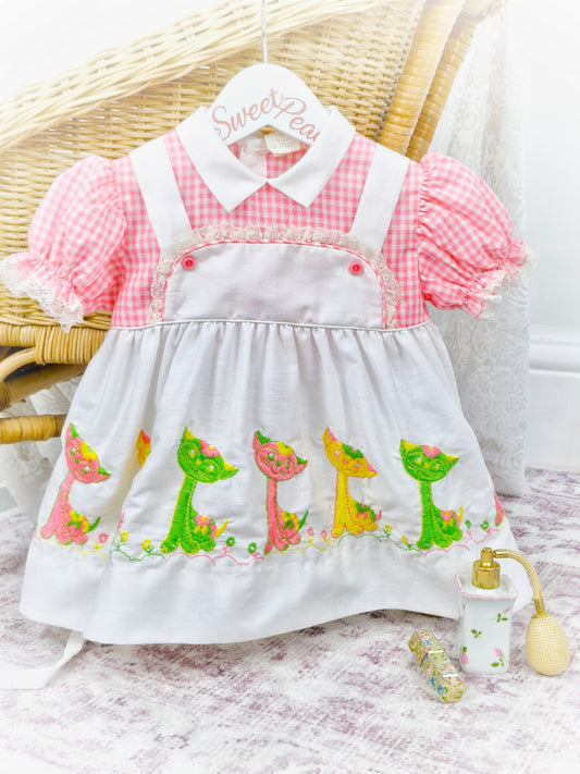 12 months. Pink and white gingham dress with mock pinny, embroidered with cats