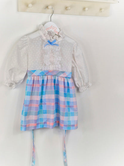 2-3 years. White New York Kids dress with pastel checked skirt and blue bow