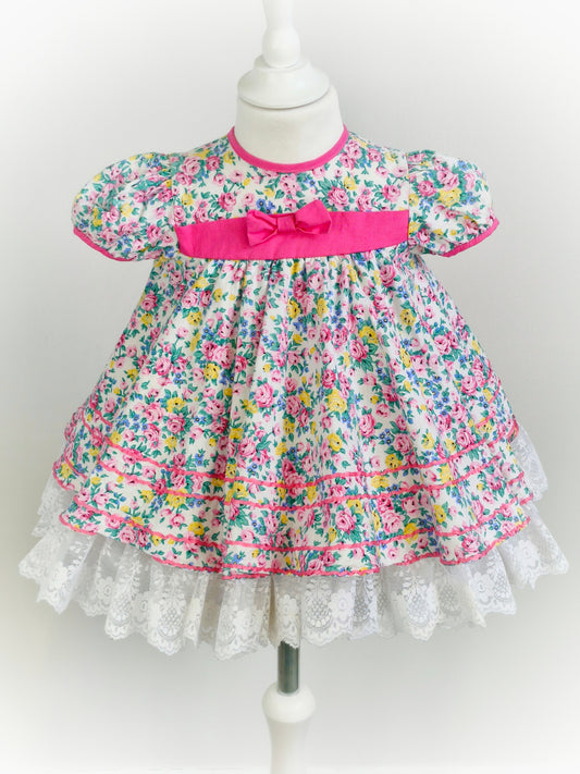 2-3 years. White and pink floral Jolene, full circle with lace hem