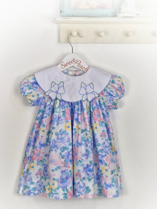 2 years. Pastel Alexis with white embroidered bib