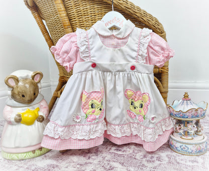 9-12 months. White and pink gingham dress, peter pan collar, pinny style and bear(?) motifs