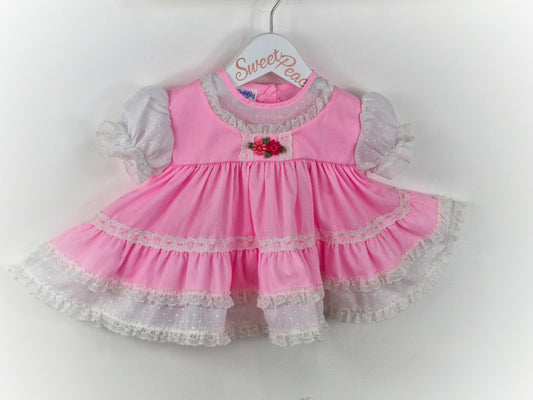 0-6 months. Miniworld pink, frilly, full circle dress