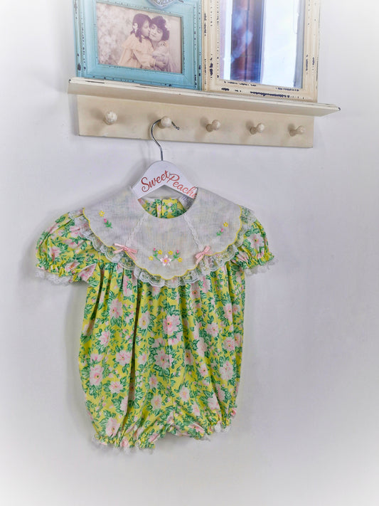 12-24 months. Floral romper with embroidered bib