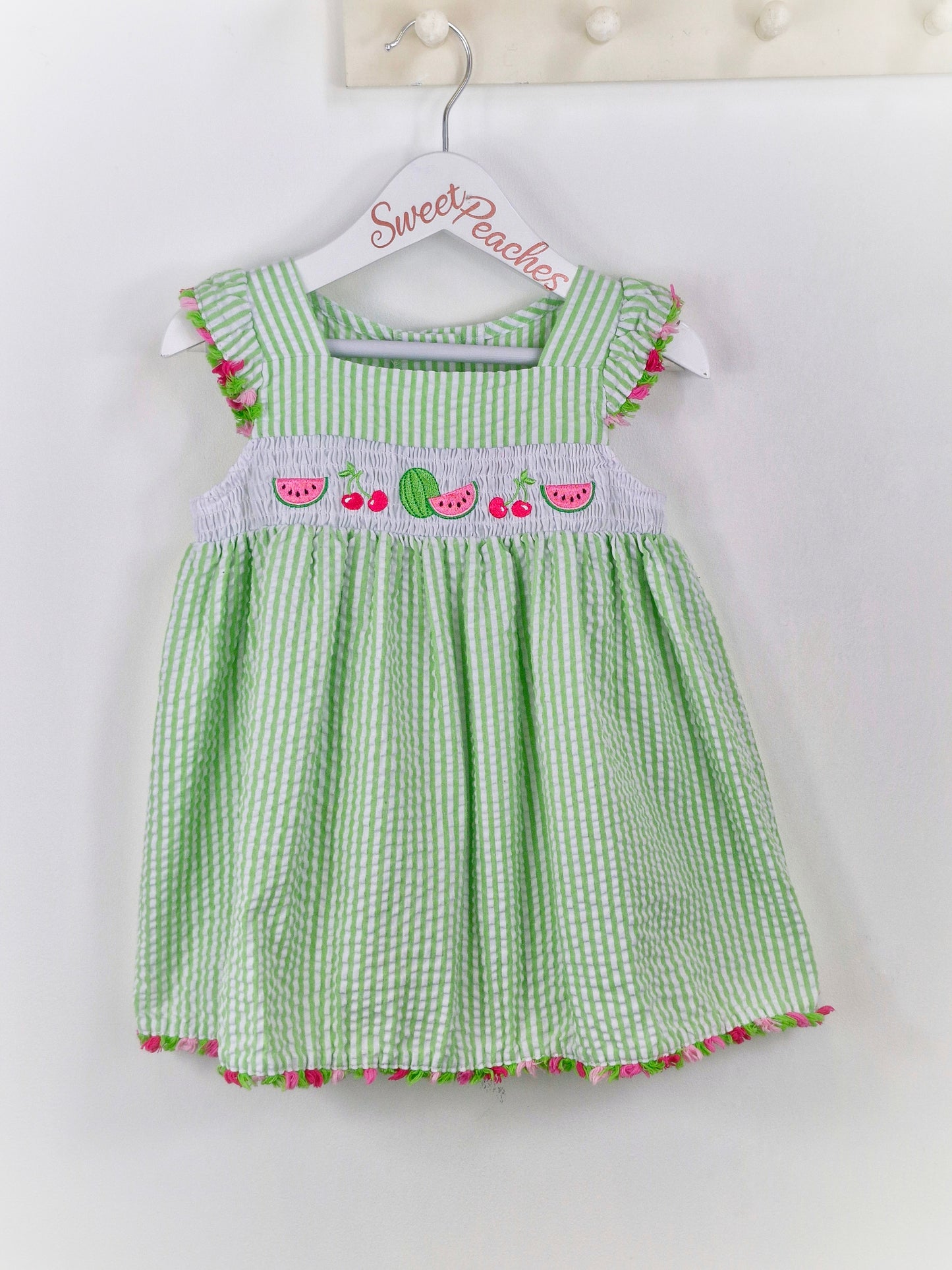 2 years. Vintage inspired Goodlad green and white seersucker striped dress with fruit smock