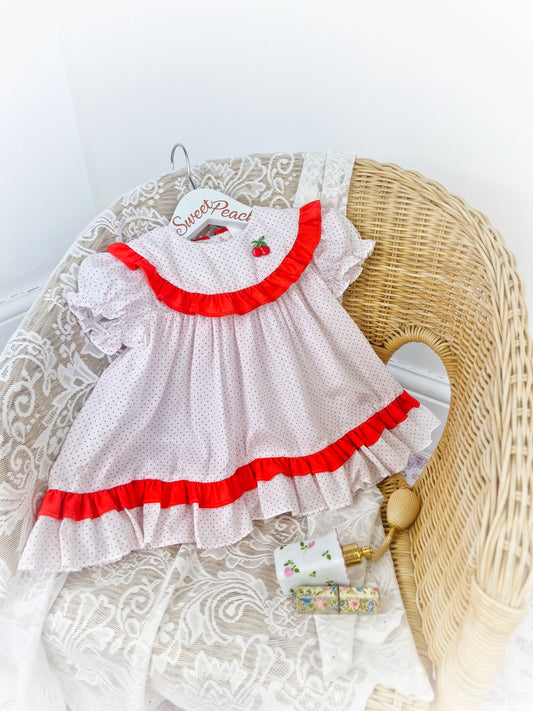 9-12 months. White with red polka dot vintage dress from Kiddie Korner, red frills and cherry applique