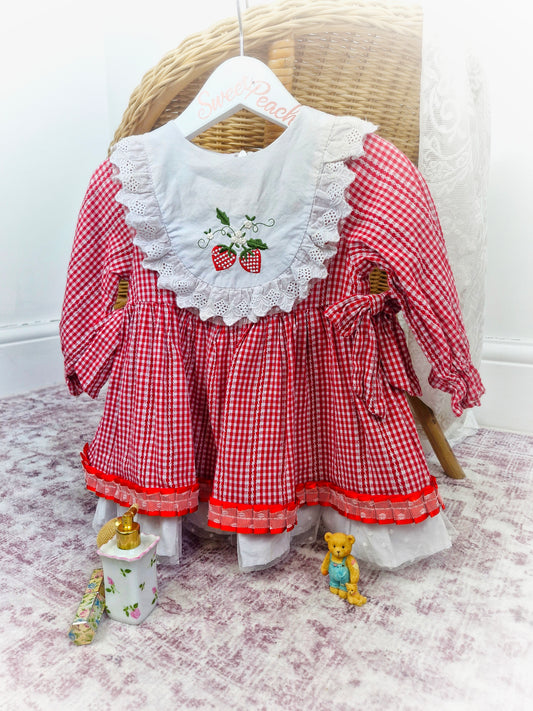 18-24 months. Vintage inspired red and white gingham dress with embroidered strawberries