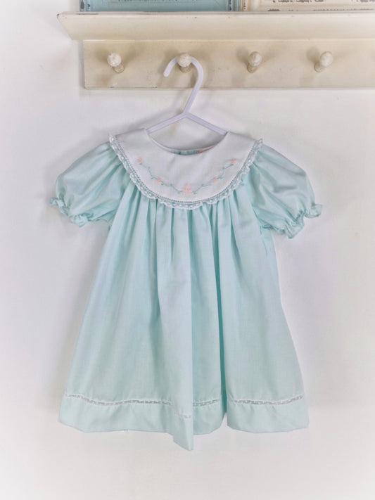12 months. Petit Ami vintage inspired mint dress with white embroidered bib