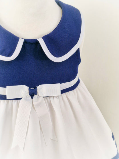 2-3 years. 3 piece set. Navy and white dress, shorts and beret