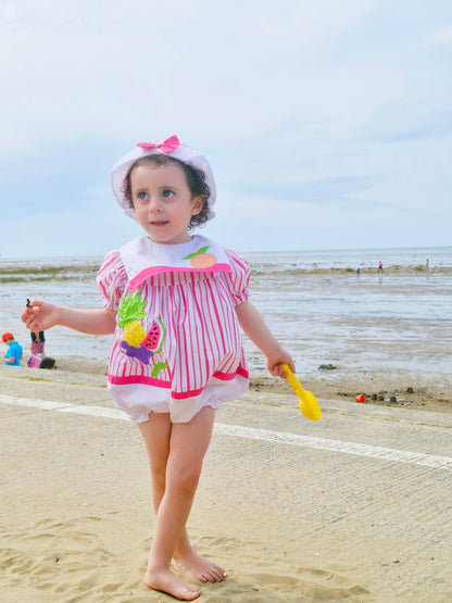 2 years. Vintage romper and matching hat from Nannette, white and hot pink stripes with fruit appliques