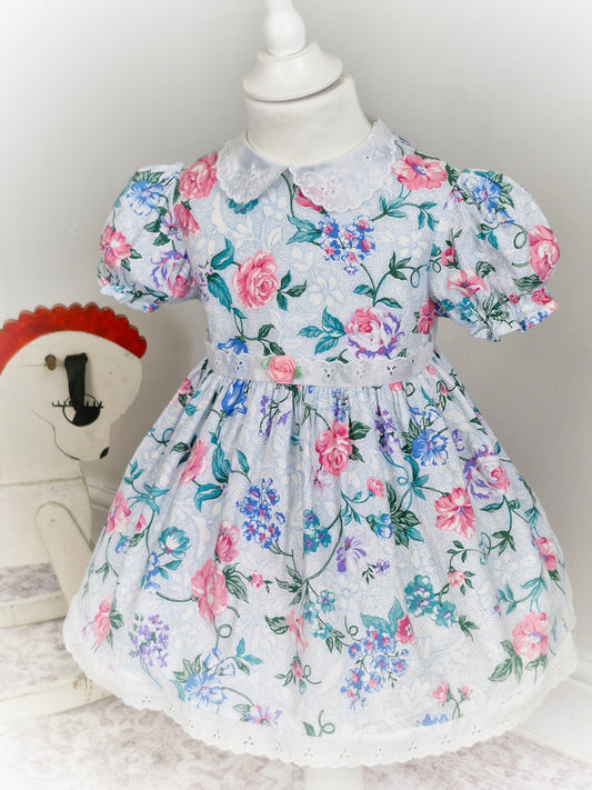 2-3 years. Vintage floral dress by Forever Florals with embroidered collar and hem