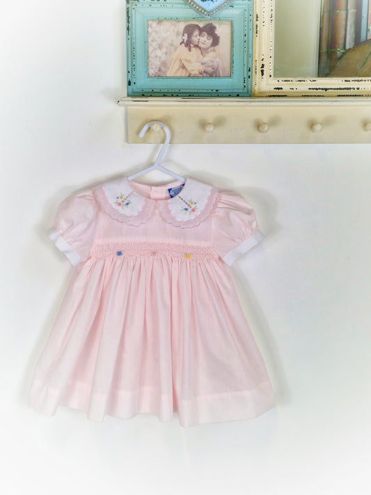 18 months. Pink vintage smock from Carriage Boutique with white collar