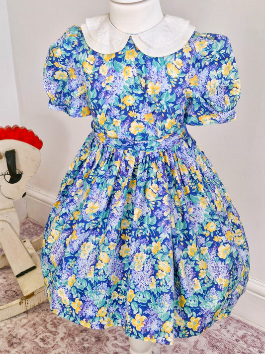 5 years. Blue and yellow Laura Ashley dress with white embroidered double collar