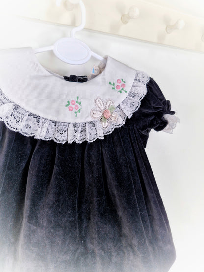9-12 months. Black velvet vintage dress with white embroidered bib and lace hem