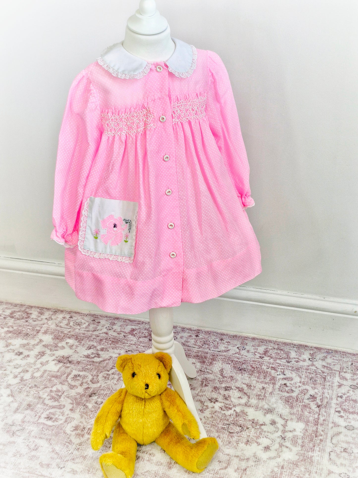 3-4 years. Pink Polly Flinders smock butron down dress with white Peter Pan collar and cute elephant pocket