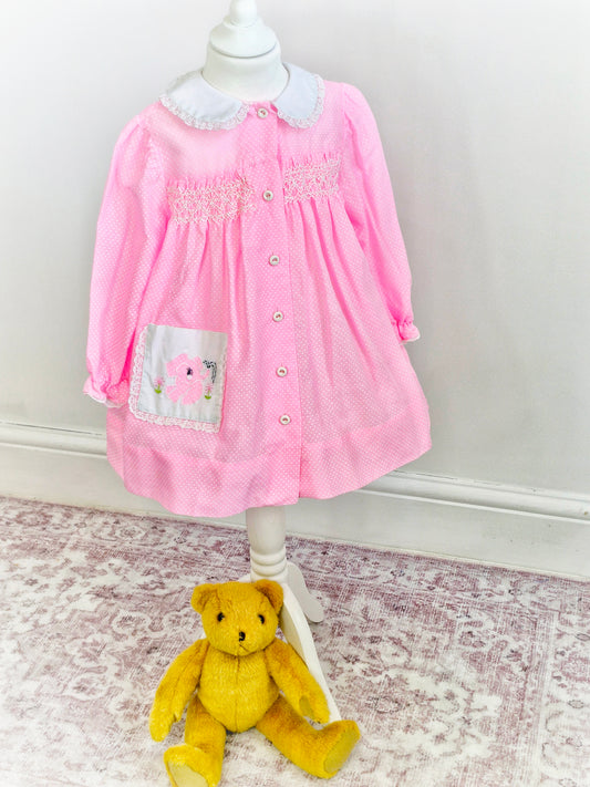 3-4 years. Pink Polly Flinders smock butron down dress with white Peter Pan collar and cute elephant pocket