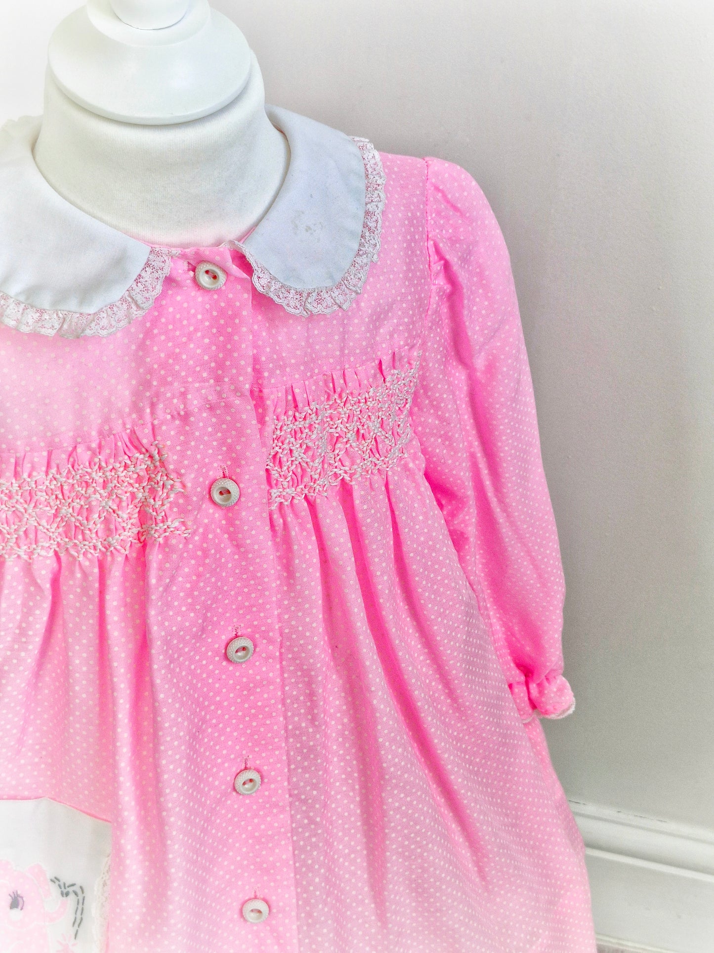 3-4 years. Pink Polly Flinders smock butron down dress with white Peter Pan collar and cute elephant pocket