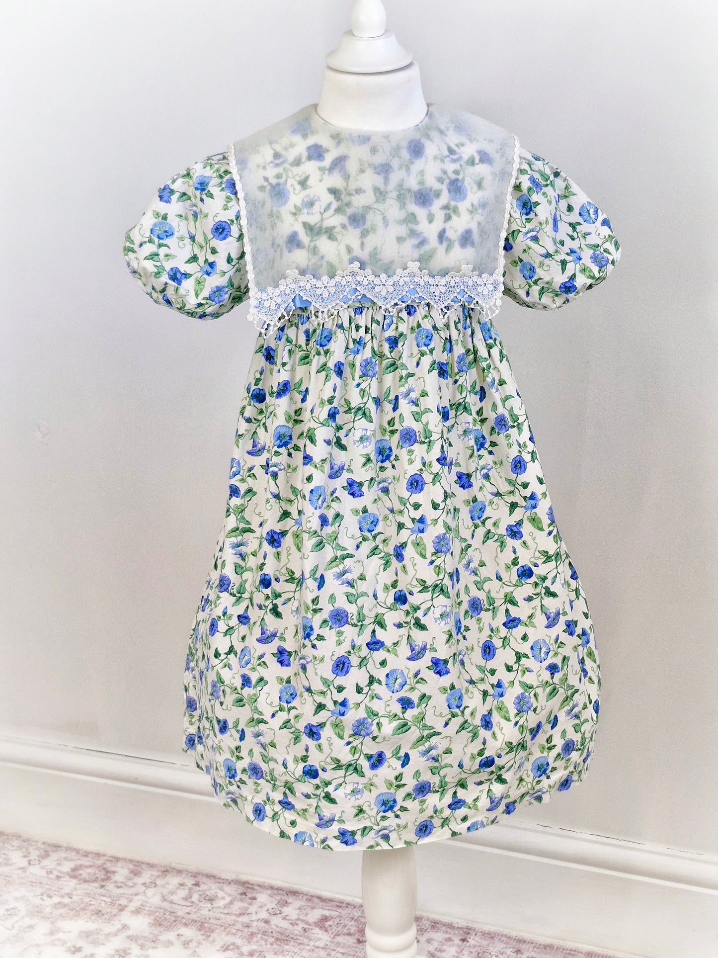 6 years. Allison Ann vintage dress, cream with blue flower print and sheer white bib