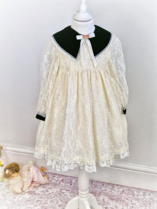 4-5 years. Cream lace vintage dress with black velour collar and cuffs from Evy