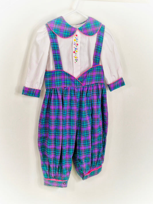 18 months. Two piece set, white blouse with embroidered flowers and checked collar and cuffs. Matching suspenders/pants.