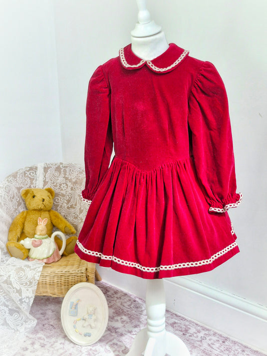 5 years. Deep red velvet handmade drop waist with dainty lace details