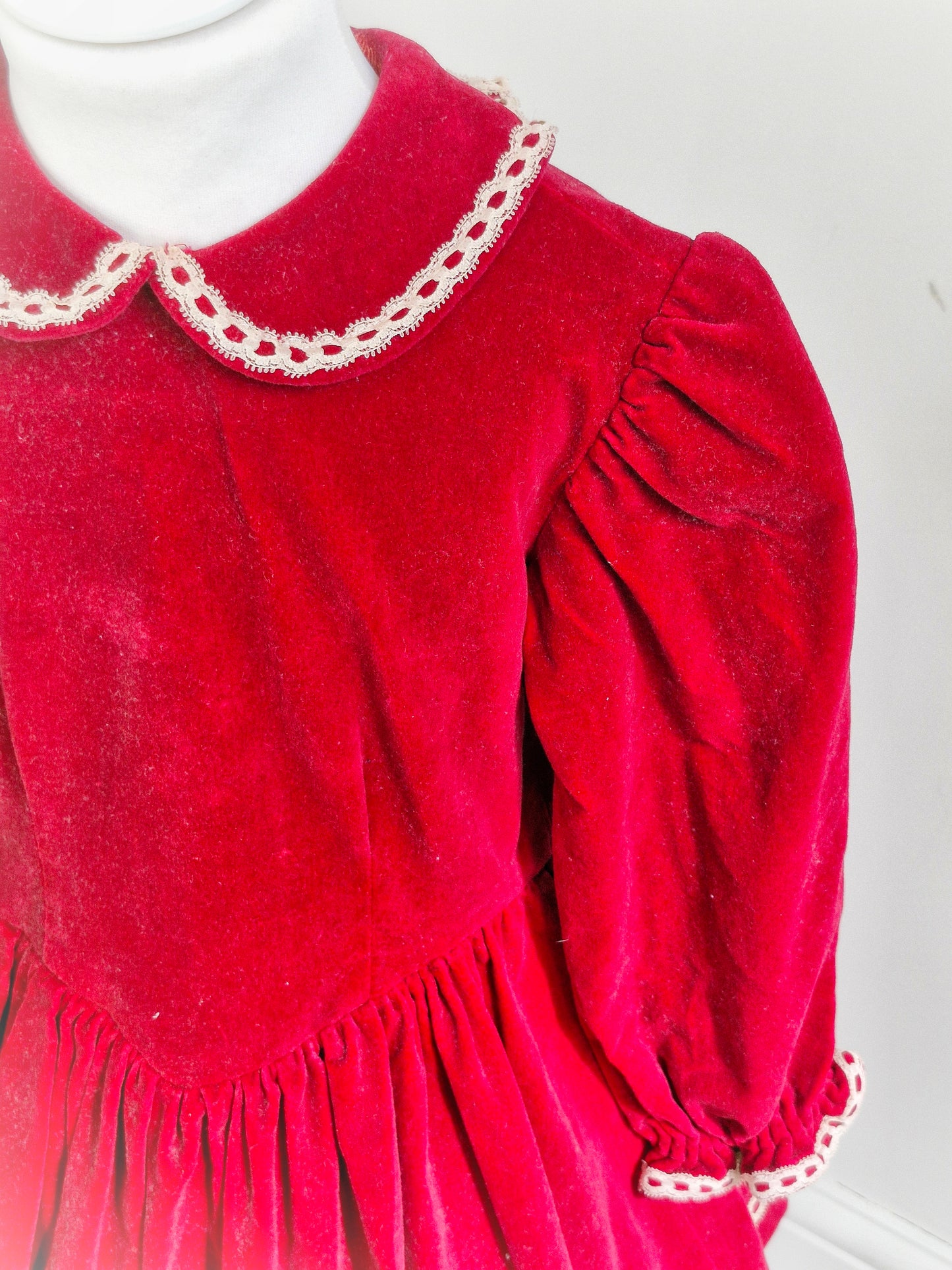 5 years. Deep red velvet handmade drop waist with dainty lace details