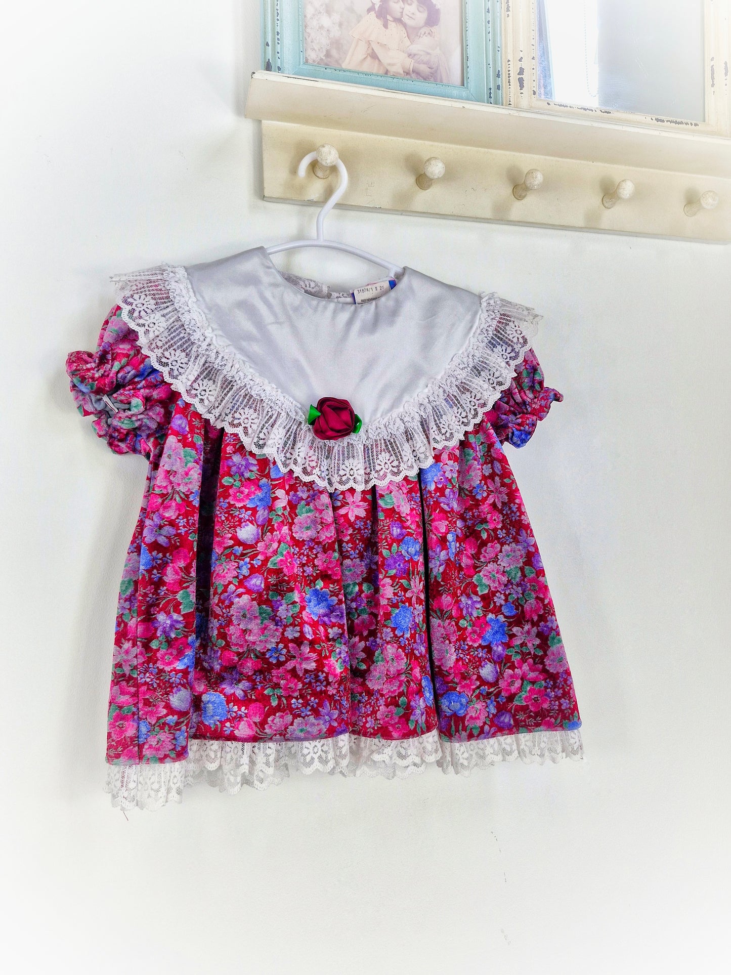 18-24 months. Vintage floral soft velvet dress with white bib and lace trim from Sweet Liberty