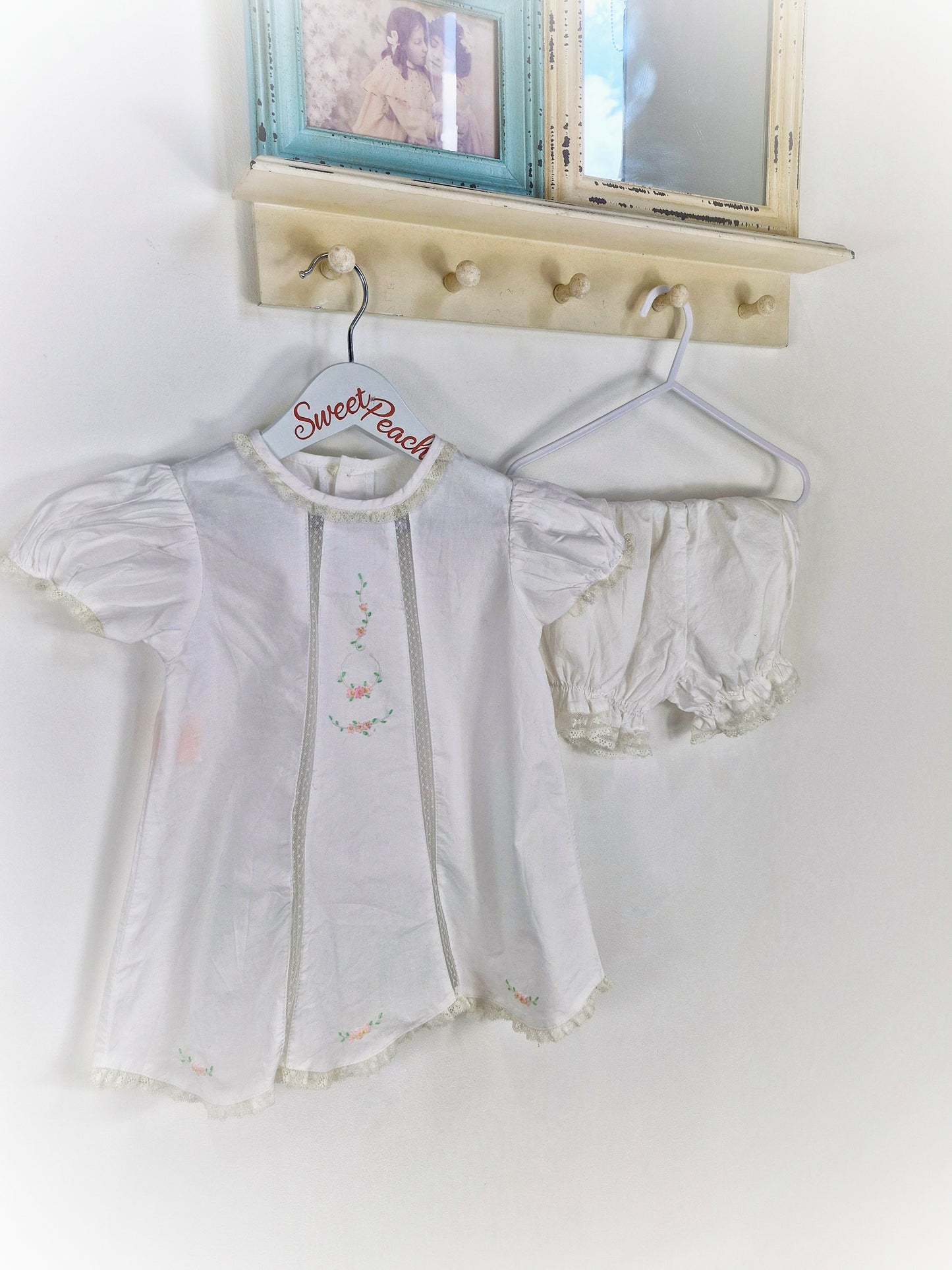2 years. Two piece set, white dress with delicate embroidered flowers and bloomers