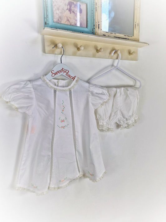 2 years. Two piece set, white dress with delicate embroidered flowers and bloomers