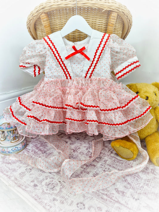 12 months. White vintage taffeta dress with red polka dots and trim