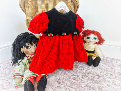 12 months. Red and black velvet dress with polka dots and rosettes