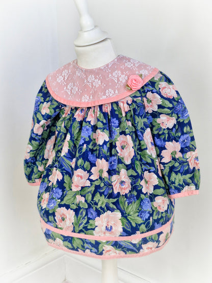 18-24 months. Blue and pink vintage floral dress with large pink lace bib