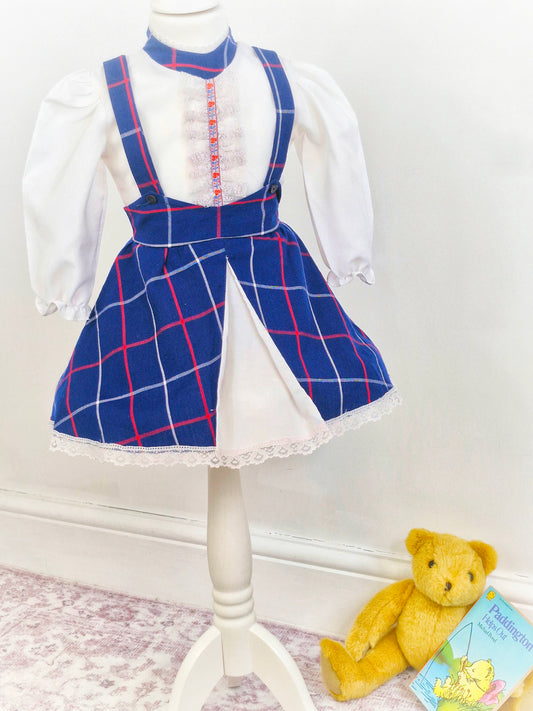 3 years. Vintage dress, white with navy checked mock apron and white lace