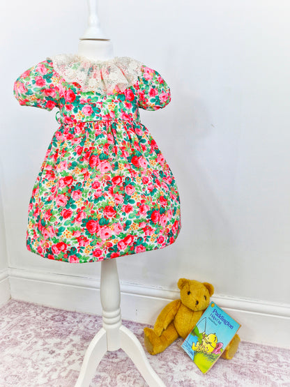 2-3 years. Vintage Sylvia White floral dress with white lace bib