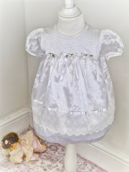 2 years. White satin and taffeta vintage dress from Rose Cottage with white bows and rosettes