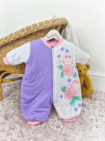 6-12 months. Reversible vintage padded snowsuit in pastel colours
