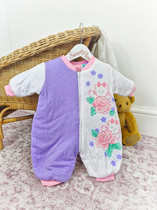 6-12 months. Reversible vintage padded snowsuit in pastel colours
