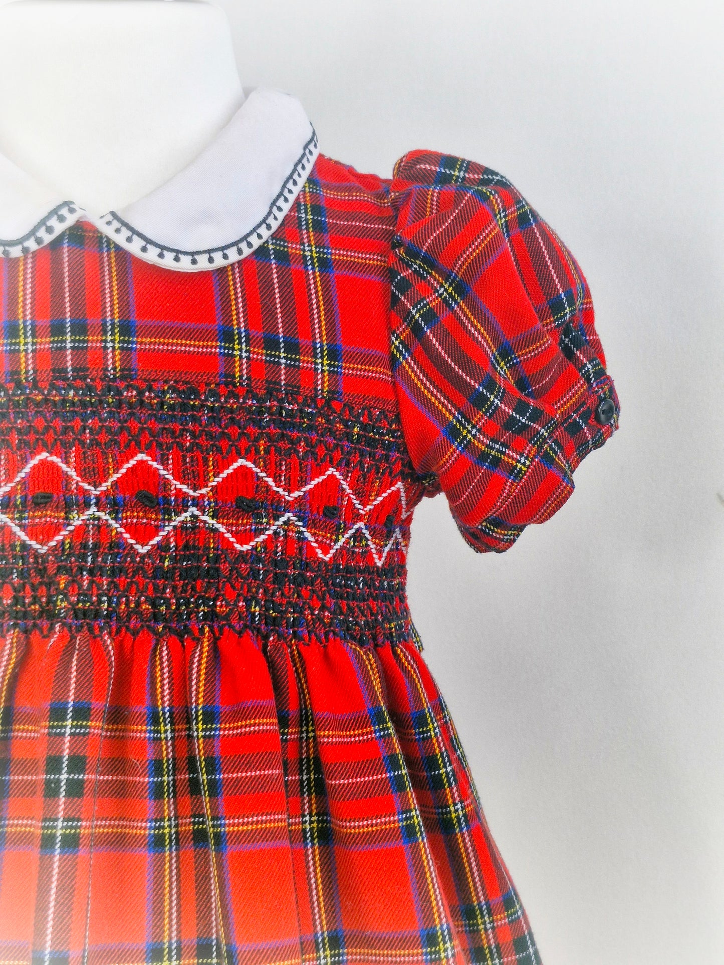 5-6 years. Little Bitty tartan smocked dress with white collar and scotty dog